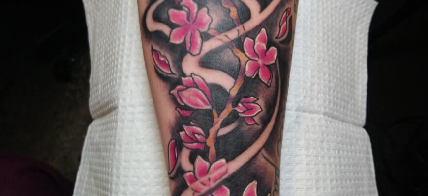 Cherry blossom forearm tattoo
