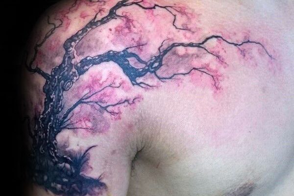 Male cherry blossom tattoo